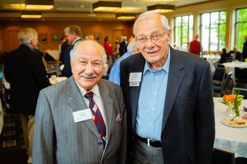 Glenn Niemeyer posing with Samir Ishak at the Retiree Reception.